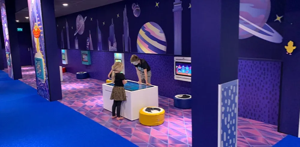 Space-themed interactive play area at Home Center Wolvega