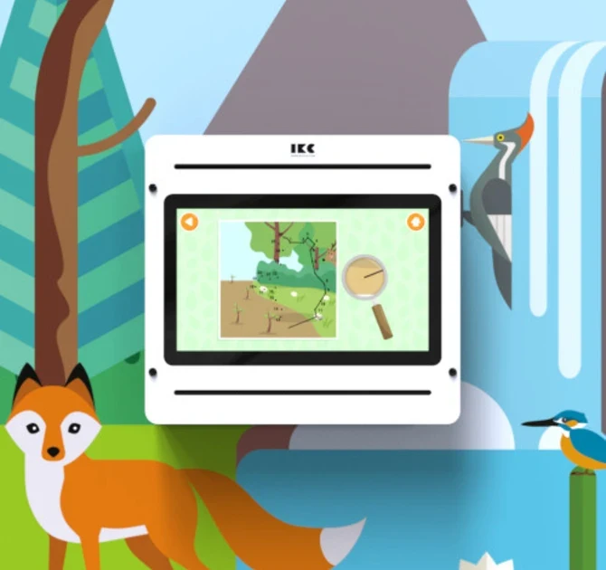 Child playing an IKC game on an interactive screen