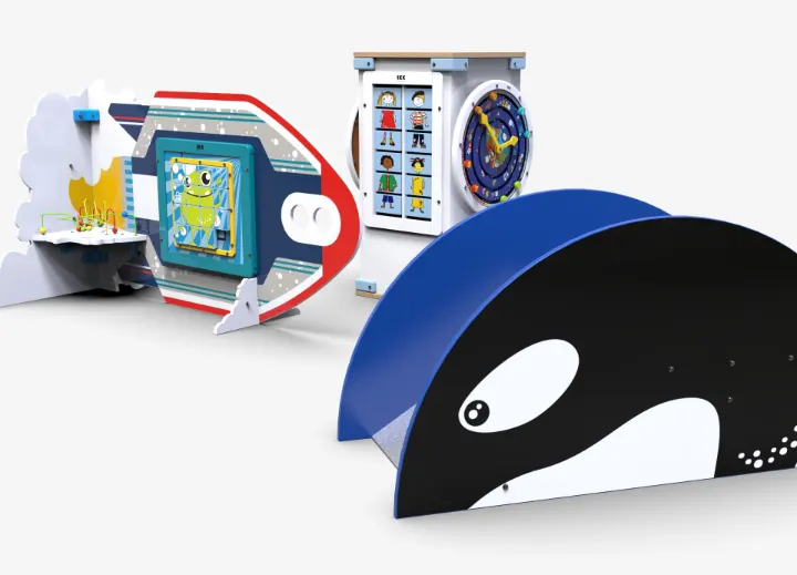 IKC play systems including an orca slide and play tower