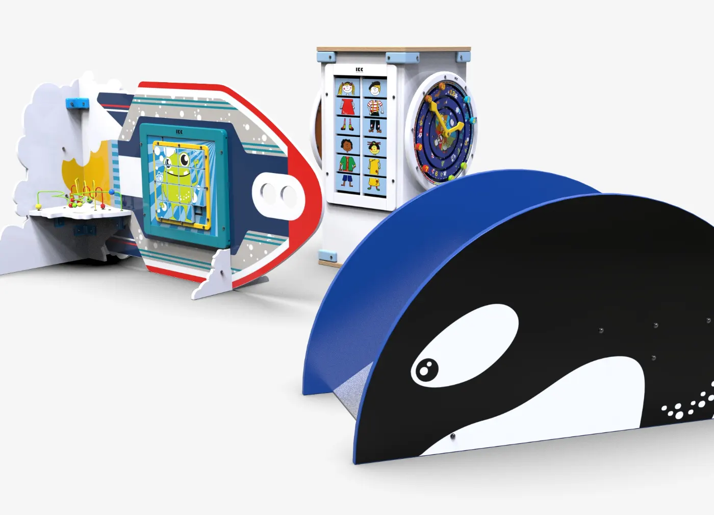 IKC play systems including an orca slide, a play tower and a boat