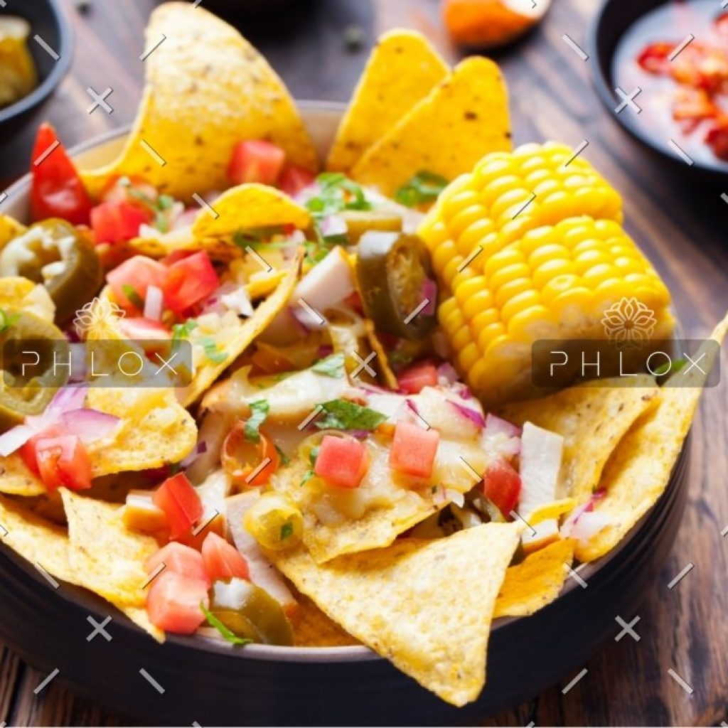 nachos-with-melted-cheese-sauce-salsa-corn-cobs-PMBWCHA